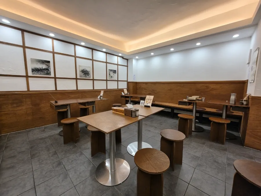Interior and counter seating at Baekok Myeongdong