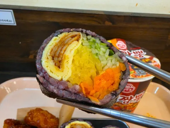 Vegetable-filled Korean kimbap with purple rice