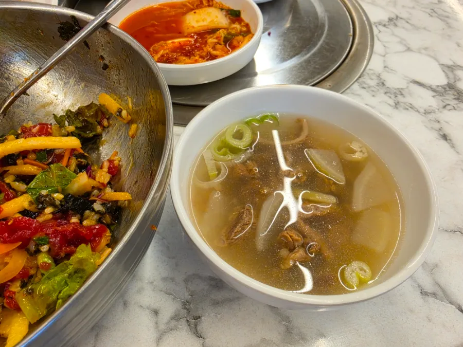 Korean beef and radish soup served with yukhoe bibimbap