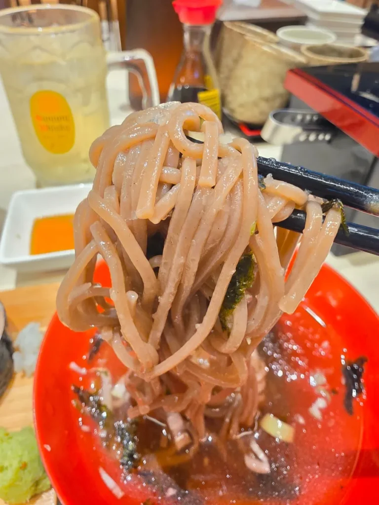 Cold soba noodles included with a sushi set in Seoul