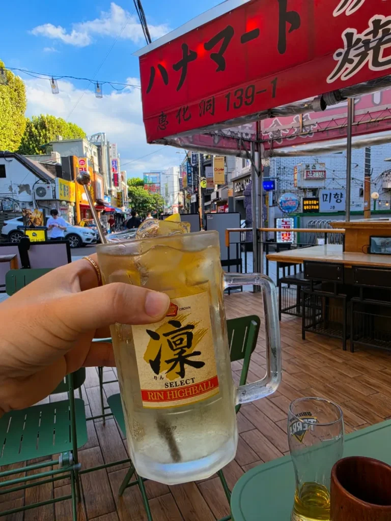 Highball at the outdoor seating area of Hanamato Hyehwa izakaya in Seoul.