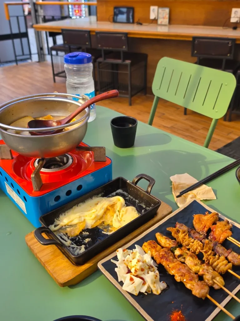 Oden, yakitori and cheese potato dishes at Hanamato Hyehwa in Seoul.