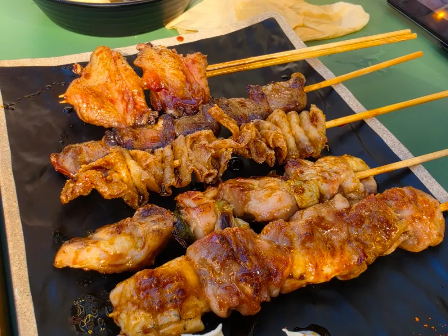 Five grilled yakitori skewers at Hanamato Hyehwa in Seoul.