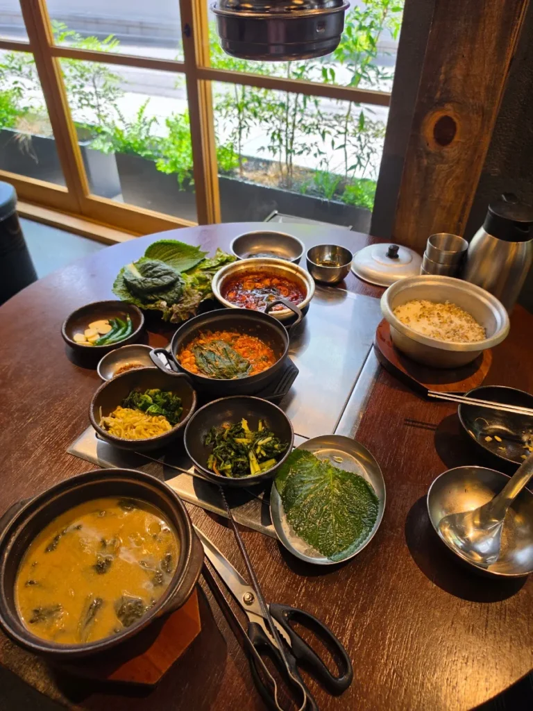 Korean side dishes and freshly cooked pot rice at Eom Yong Baek
