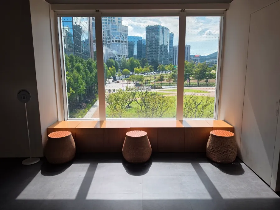 Rest area inside Seoul Museum of Craft Art with a view of Seoul