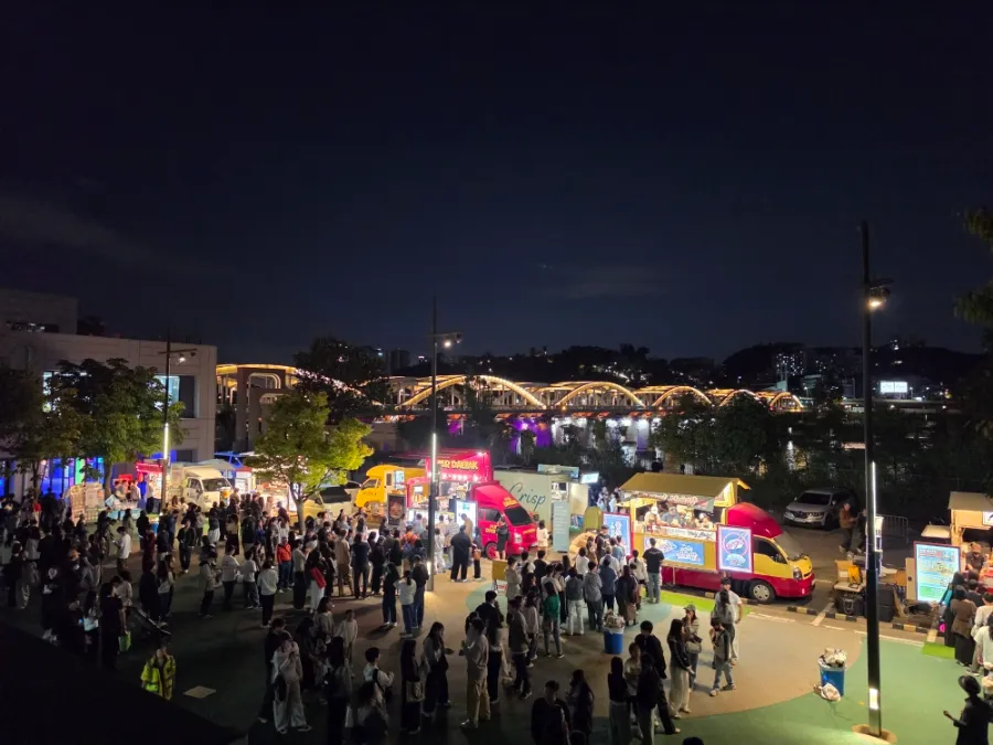 Long lines at food trucks during the Nodeul Island festival in Seoul